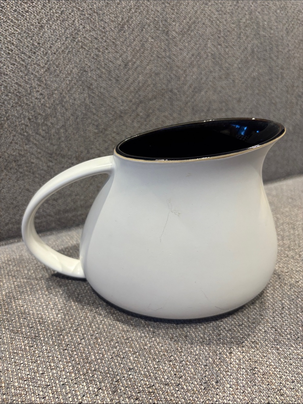 Denby England White Ceramic creamer with Black Interior and Gold Trim